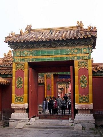 Forbidden city - One of the many doors with glazed terracotta decorations