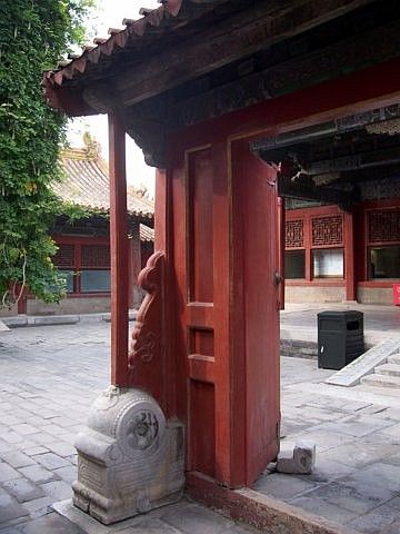 Forbidden city - Wooden door in front of a palace