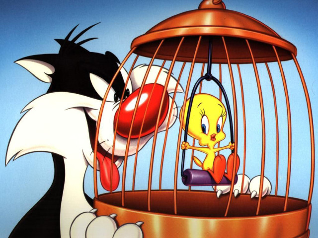 Tweety watching Sylvester from his cage